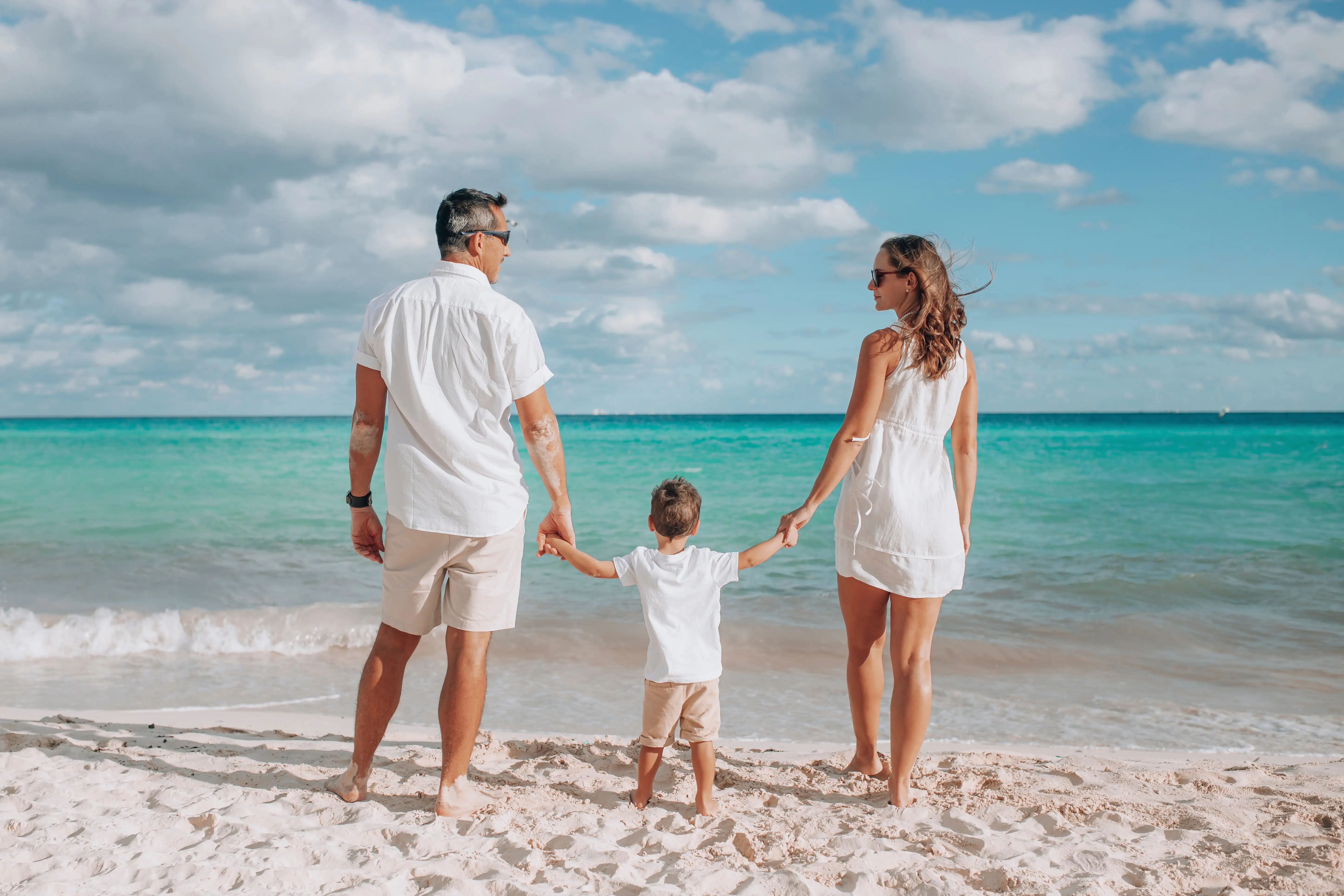 A family having fun on the beach in Cancun