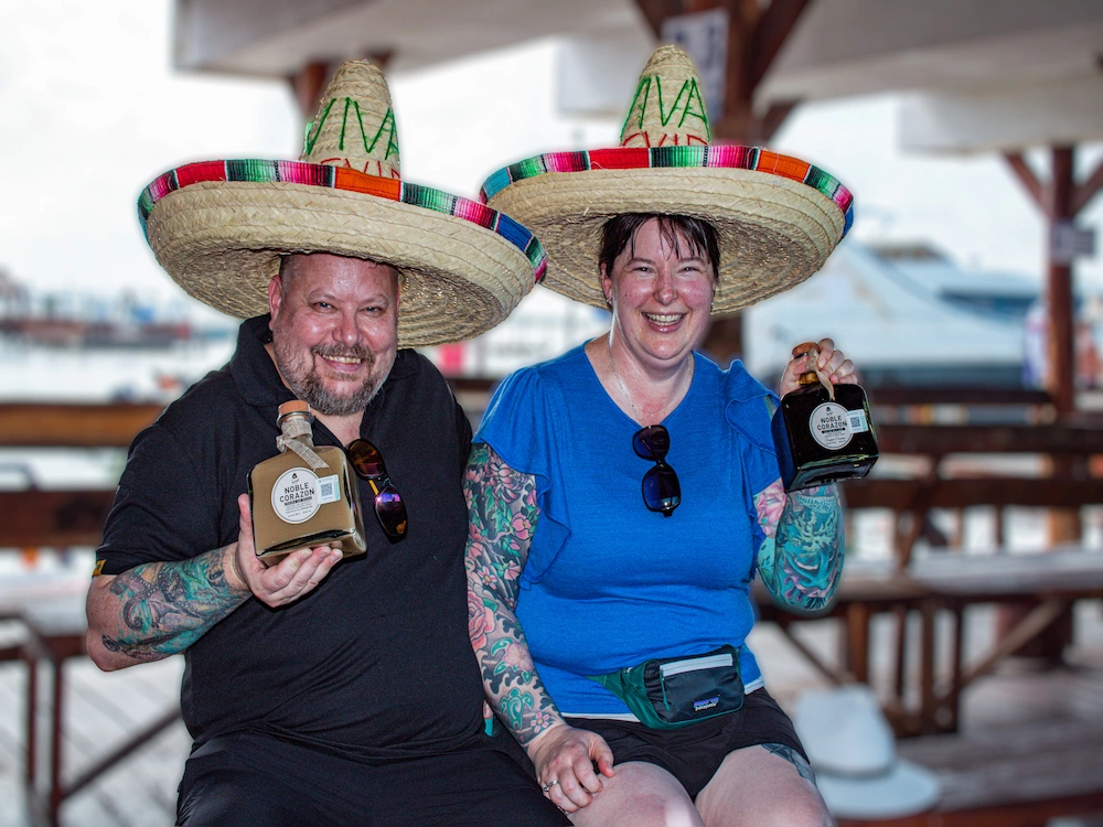 A couple enjoying the experience of a tequila tasting in Cancun.